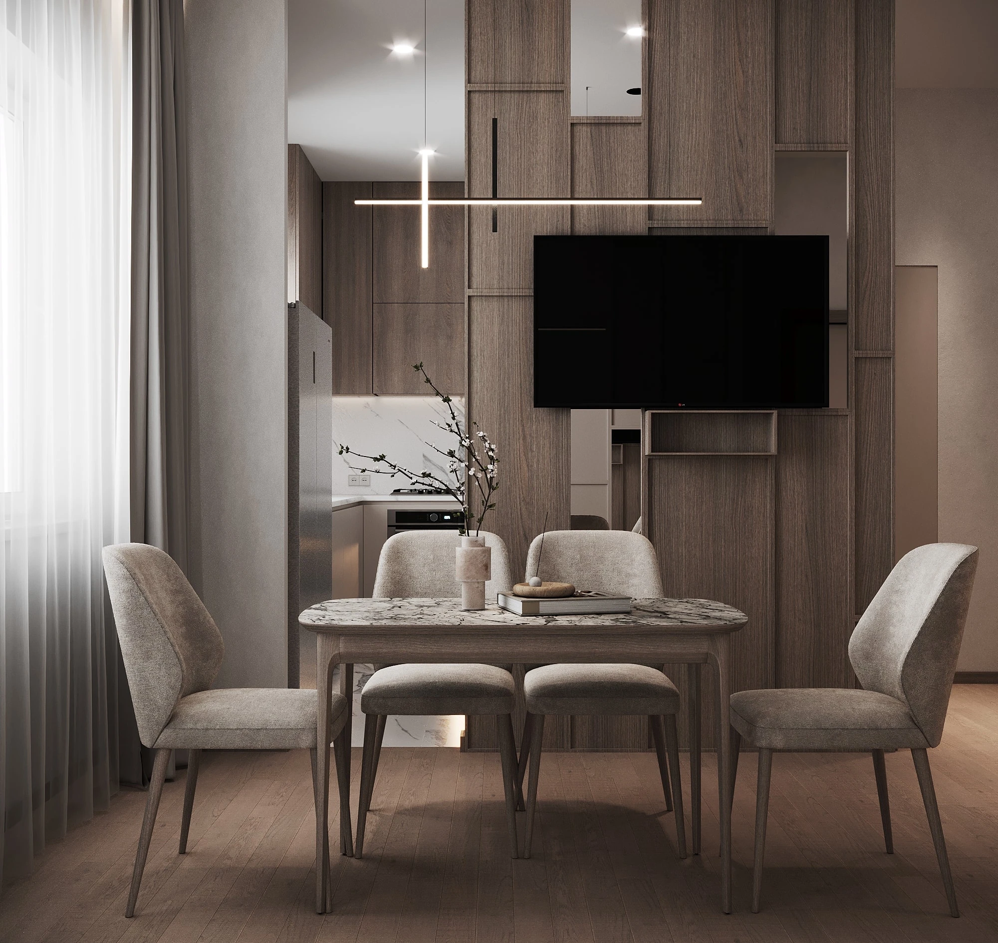 Warm timber, neutral textiles and considered lighting connect the dining and living spaces.