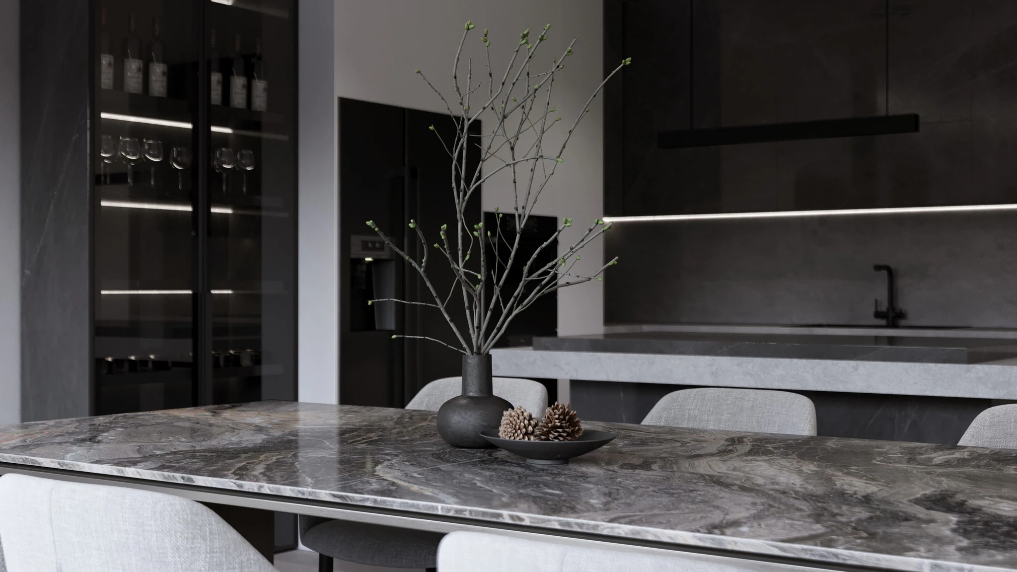 A study in dark stone, restrained joinery and soft daylight across a contemporary residential interior.